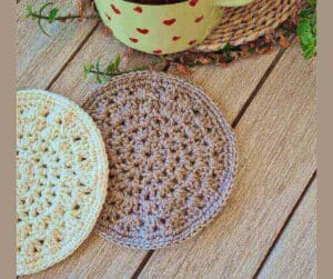Pair of crochet hot pot holders in two cotton colors