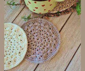 Pair of crochet hot pot holders in two cotton colors