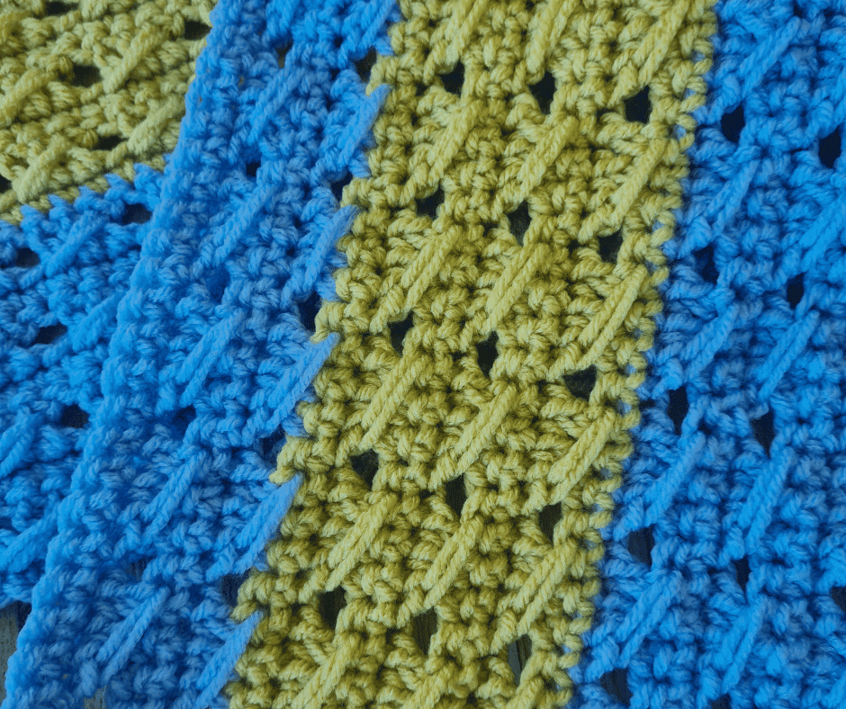 Close up of striped double crochet stitch texture on poncho wrap